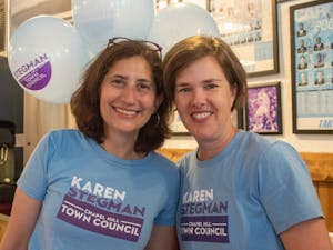 Council Member Karen Stegman smiles with her wife, Alyson Grine, at Italian Pizzeria III on Saturday June, 12, 2021, to celebrate Karen's reelection campaign.