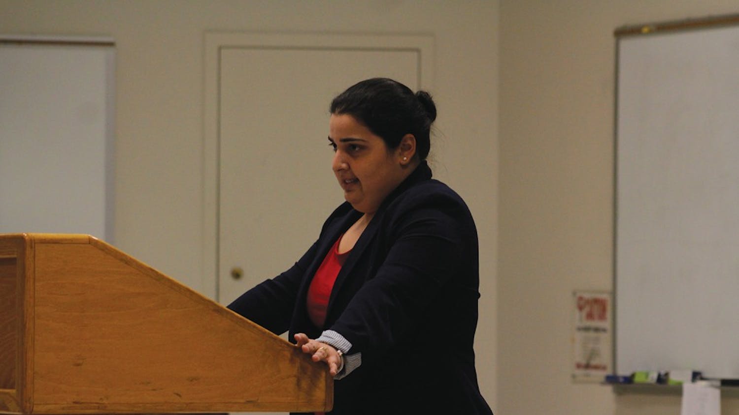 Ana Sofia Nuñez, an immigration attorney from Raleigh, discusses House Bill 63 and immigrants' rights on Wednesday during a panel on the topic of undocumented immigrants.