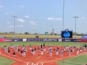 Players participate in the closing ceremony of Athletes Unlimited's summer softball league this past summer. Photo courtesy of Athletes Unlimited.