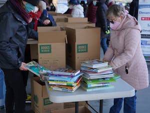 Volunteers count books at the Dream Big Book Drive in Durham on Jan. 17, 2022. Photo courtesy of Benay Hicks.
