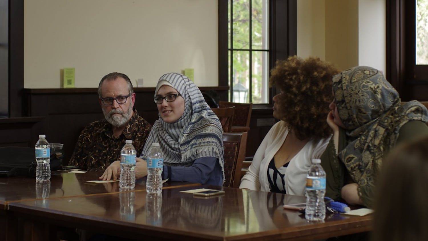 From Left, Professor Carl Ernst, Soumaya Lansari, Iyman Gaspard and Mariam Baaj speak at the Understanding Muslims and Islam Panel at the Campus Y on Monday.
