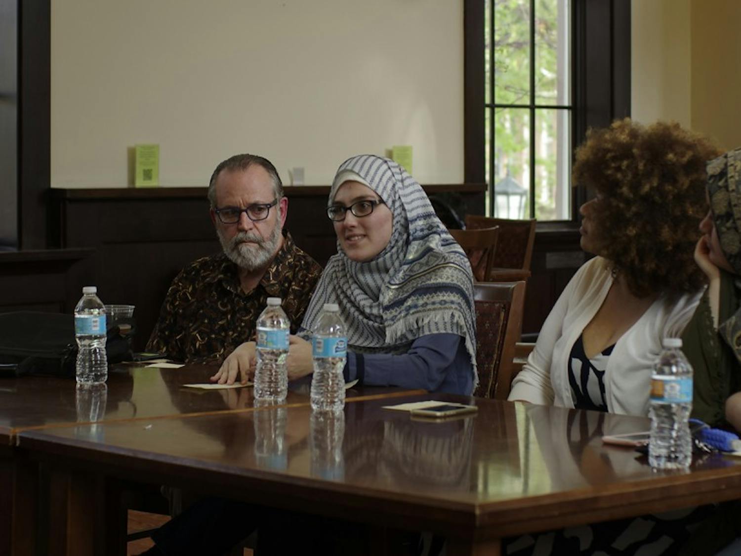 From Left, Professor Carl Ernst, Soumaya Lansari, Iyman Gaspard and Mariam Baaj speak at the Understanding Muslims and Islam Panel at the Campus Y on Monday.