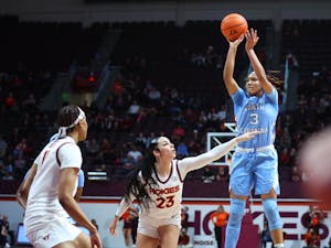 UNC junior wing Kennedy Todd-Williams (3) shoots a jump shot at Cassell Coliseum in Blacksburg, Va. on Sunday, Jan. 1, 2023. UNC fell to Virginia Tech 68-65. Photo courtesy of UNC Athletic Communications.