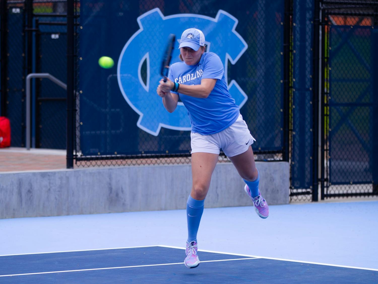 UNC first-year Reese Brantmeier hitting the ball during a match against the Florida State University Seminoles at the Cone-Kenfield Tennis Center on Friday, March 31, 2023. The Tar Heels won 6-1.