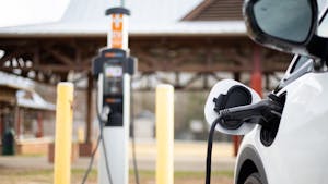 An electric car charges at one of Carrboro's new EV charging stations on Feb. 8, 2022. The charging station, located at the Carrboro Plaza, was installed in 2021 as part of the town's Community Climate Action Plan initiatives.