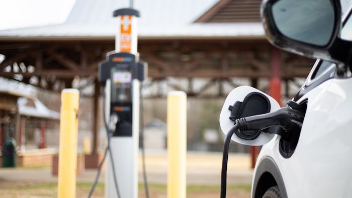 An electric car charges at one of Carrboro's new EV charging stations on Feb. 8, 2022. The charging station, located at the Carrboro Plaza, was installed in 2021 as part of the town's Community Climate Action Plan initiatives.