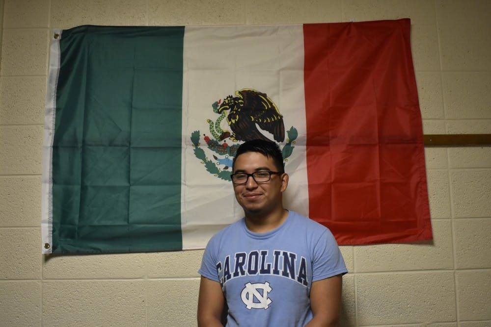 Sam Gomez Olivera honors his Mexican culture by displaying a Mexican flag in his dorm. 