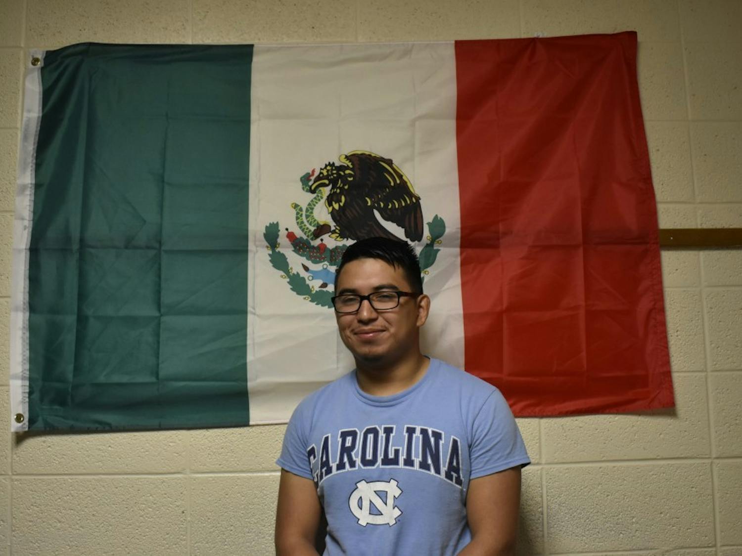 Sam Gomez Olivera honors his Mexican culture by displaying a Mexican flag in his dorm. 