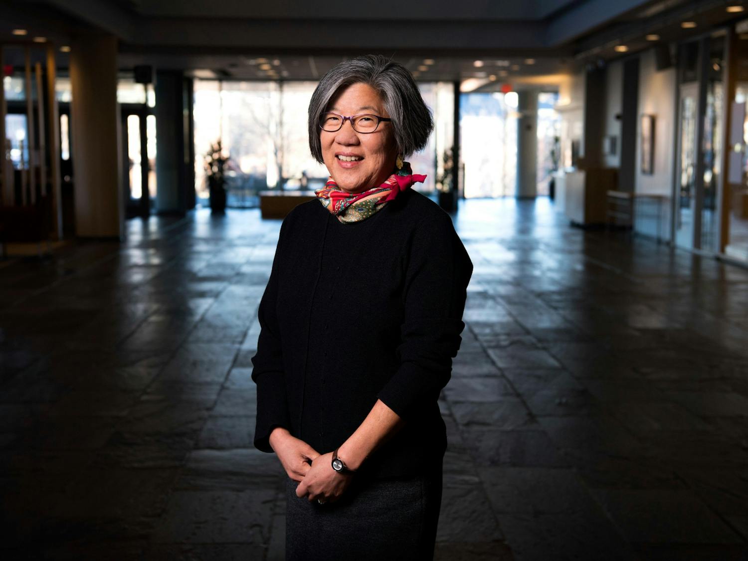 Anna Wu, who has worked at the University for nearly 30 years, poses inside the foyer of the FedEx Global Education Center. She is retiring as the associate vice chancellor for facility services.
Photo Courtesy of Jon Gardiner/UNC.