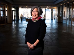 Anna Wu, who has worked at the University for nearly 30 years, poses inside the foyer of the FedEx Global Education Center. She is retiring as the associate vice chancellor for facility services.
Photo Courtesy of Jon Gardiner/UNC.