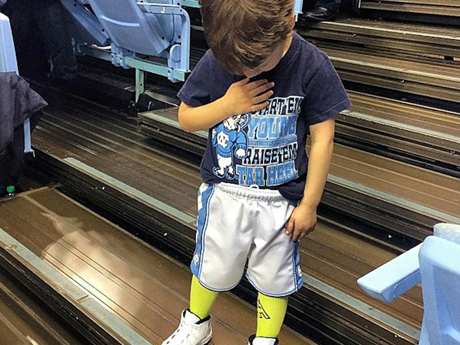 Brady Hoots, 3, became an internet hit recently after a video of him at a UNC men’s basketball game was shared more than 6,000 times. Courtesy of Eric Hoots.
