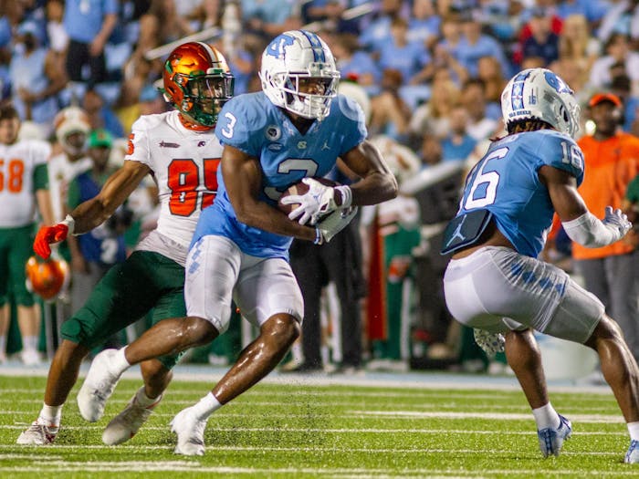 Senior wide receiver Antoine Green (3) runs the ball down the field during UNC's opening game against Florida A&M at Kenan Stadium on Aug. 27, 2022. UNC won 56-24.