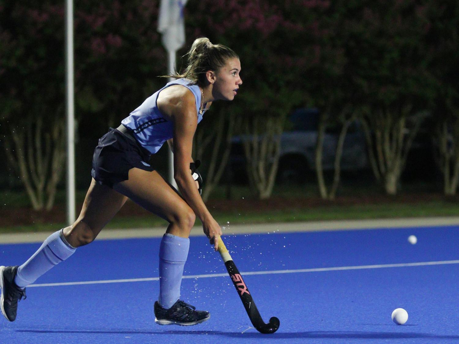 First-year forward Ashley Sessa (3) looks for an open pass. UNC beat Duke 4-1 away on Saturday, Aug. 20, 2022.