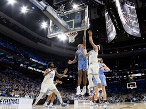 UNC junior forward Armando Bacot (5) goes up for a block during the regional semifinals of the NCAA Tournament in Philadelphia, Penn., on Friday, March 25, 2022. UNC won 73-66.