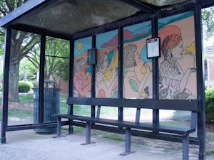 Janvika Shah's artwork decorates a bus shelter on South Road in Chapel Hill.