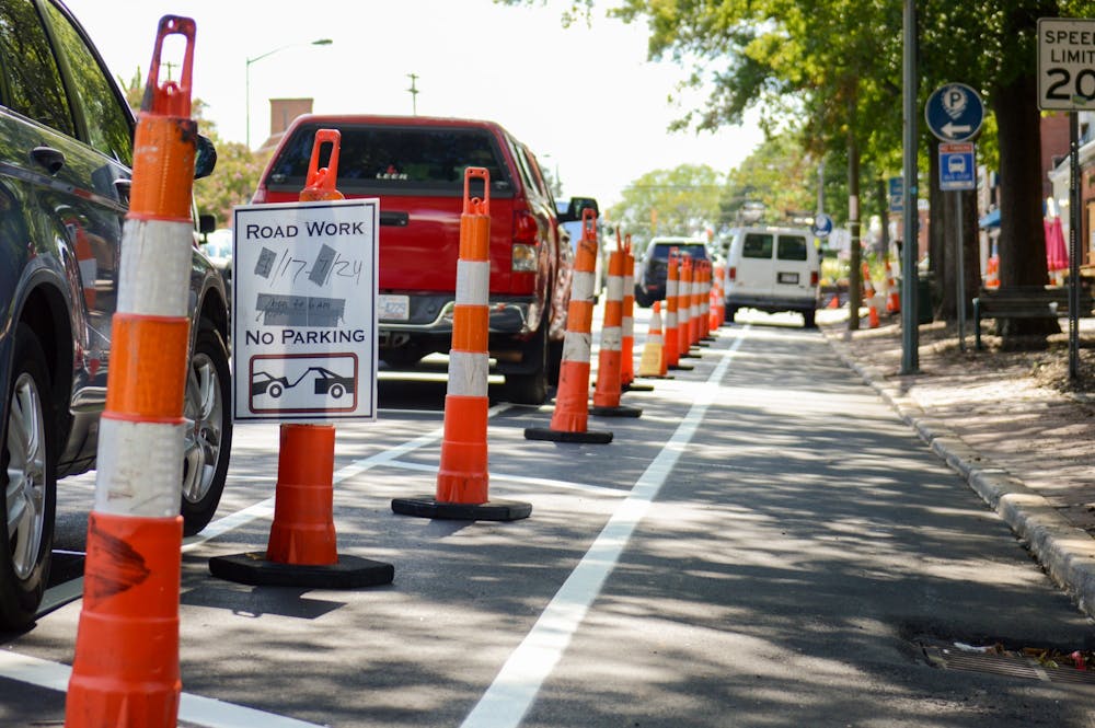 Franklin Street on August 8, 2022. "No Parking" signs line the streets in Chapel Hill and Carrboro as roads continue to be resurfaced.