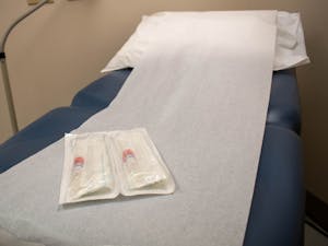 A test for syphilis lies on a patient bed at UNC Campus Health on Monday, April 17, 2023. Syphilis cases are rising in North Carolina, and in 2022, about every six out of 55 congenital cases stemmed from the Orange, Durham, Chatham and Wake County areas.
