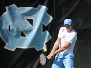 UNC men's tennis freshman Brian Cernoch prepares to return the ball in a singles match against the University of Oklahoma at Cone-Kenfield Tennis Center on Friday, Mar. 22, 2019. The No. 11 UNC men's tennis team beat No. 20 Oklahoma 4-1.