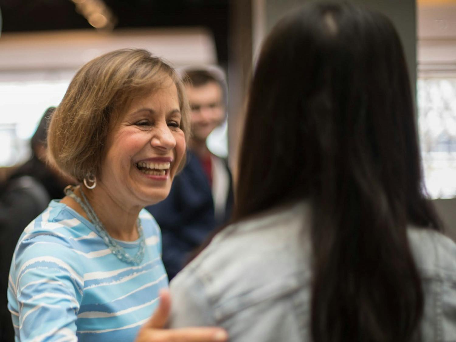 Chancellor Carol Folt hosts "Thank You, Carolina," an opportunity for students to take a selfie with her and get a slice of pizza in the Union on Tuesday, Jan. 29, 2019.