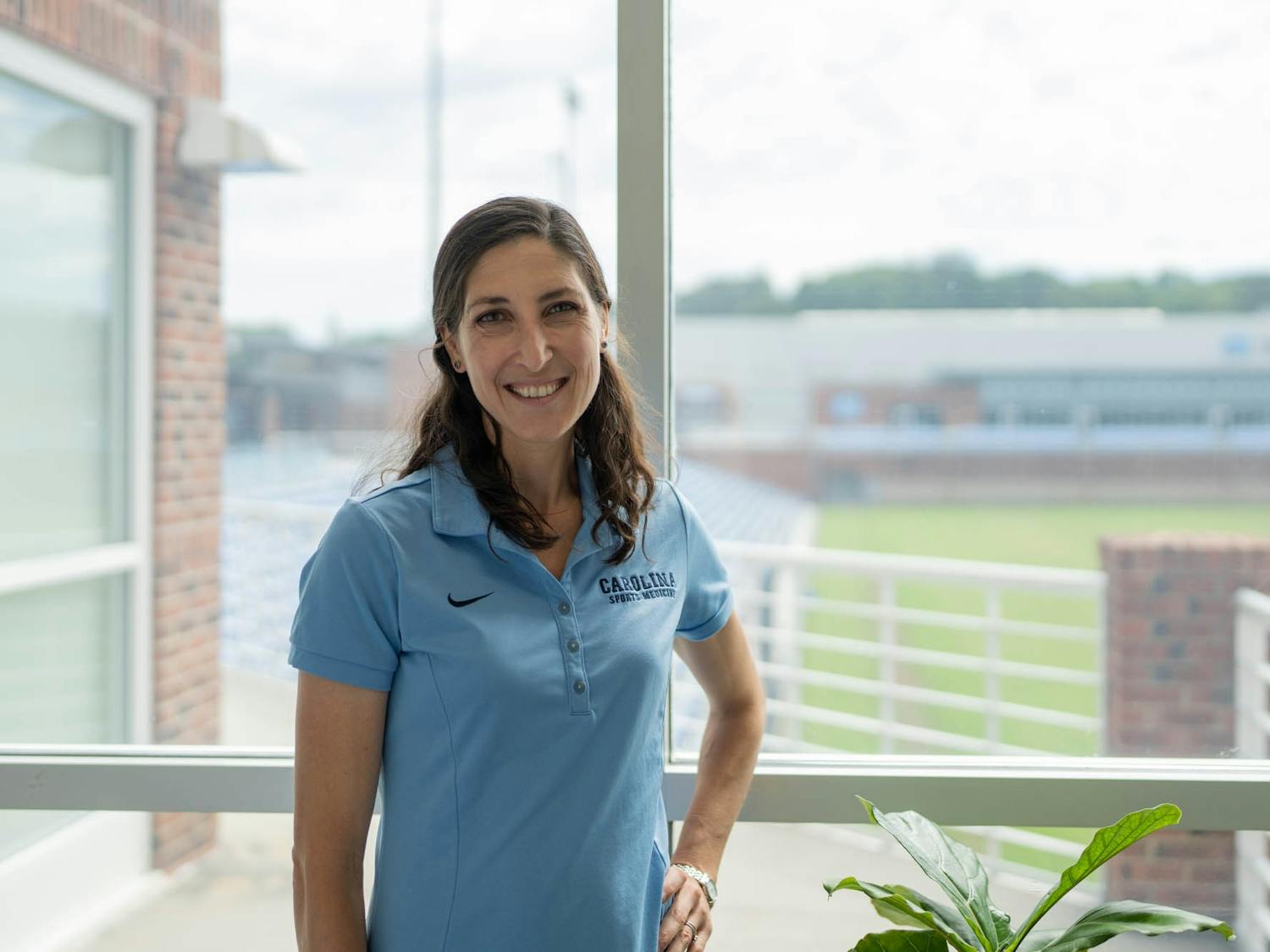 Dr. Jeni Shannon, director of the Carolina Athletics Mental Health and Performance Psychology Program (AMP), poses for a portrait in her office in the McCaskill Soccer Center on Monday, June 20, 2022. Shannon, in collaboration with The Hidden Opponent, helped organize a student-led panel on mental health in athletics.