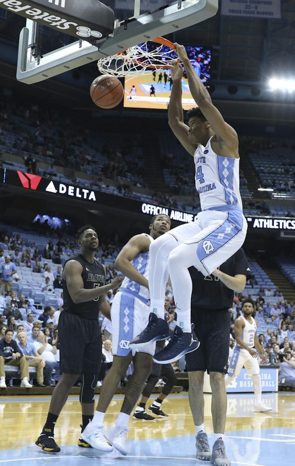 UNC forward Isaiah Hicks (4) dunks the ball against UNC-Pembroke on Friday.