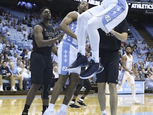 UNC forward Isaiah Hicks (4) dunks the ball against UNC-Pembroke on Friday.