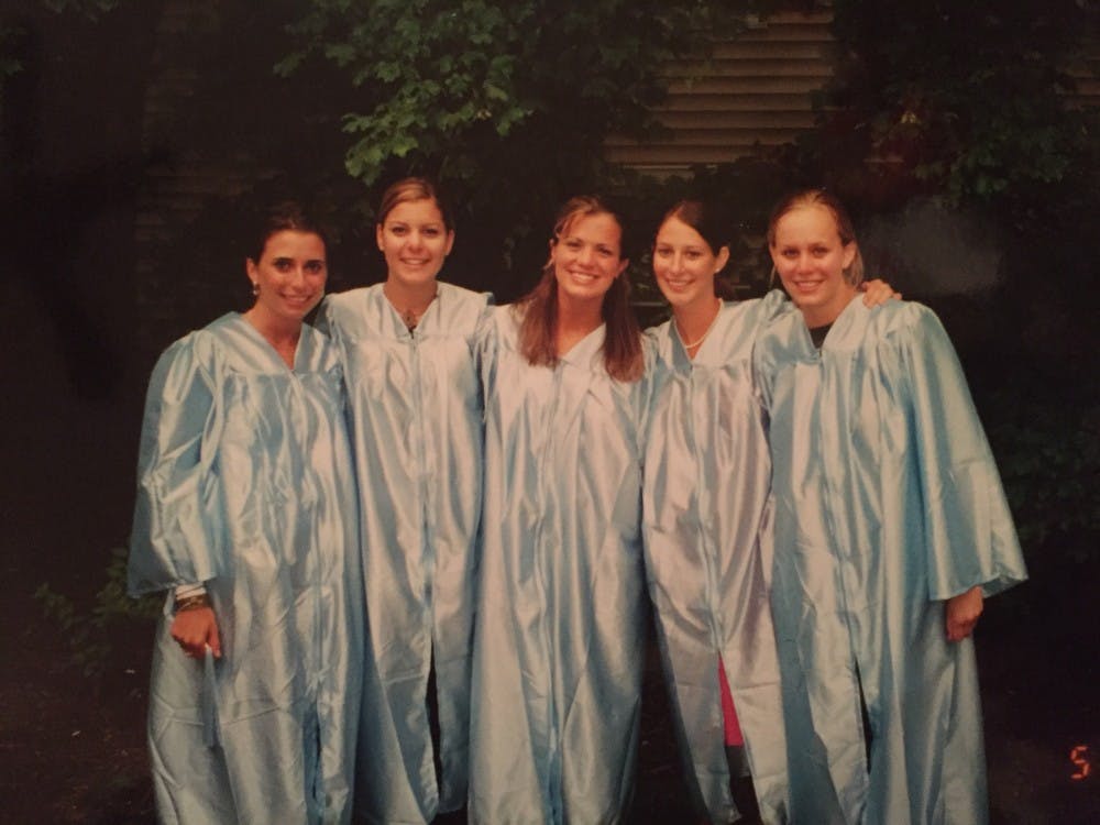 <p>Melissa Egan (middle) graduated from UNC as a Dramatic Art major in 2003. Photo courtesy of Melissa Egan.</p>
