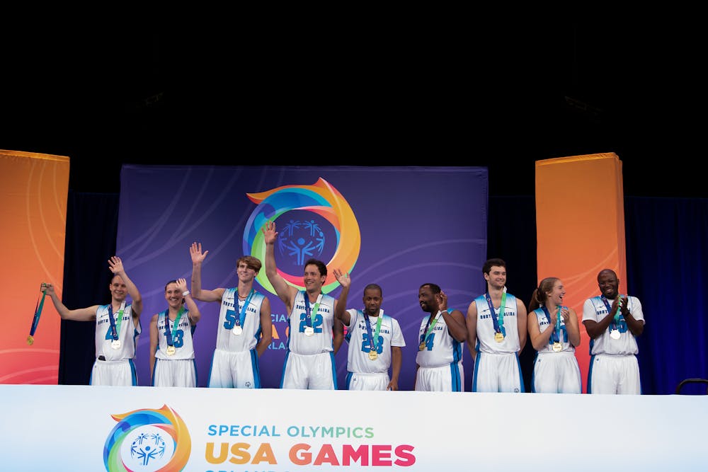 UNC Unified basketball team poses with gold medals at the 2022 Special Olympics USA Games in Orlando, Fla. The team went 5-0 in three days of competition. Photo courtesy of Special Olympics North Carolina.