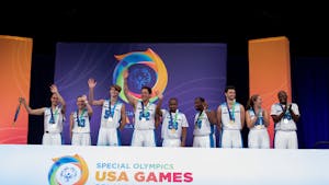 UNC Unified basketball team poses with gold medals at the 2022 Special Olympics USA Games in Orlando, Fla. The team went 5-0 in three days of competition. Photo courtesy of Special Olympics North Carolina.