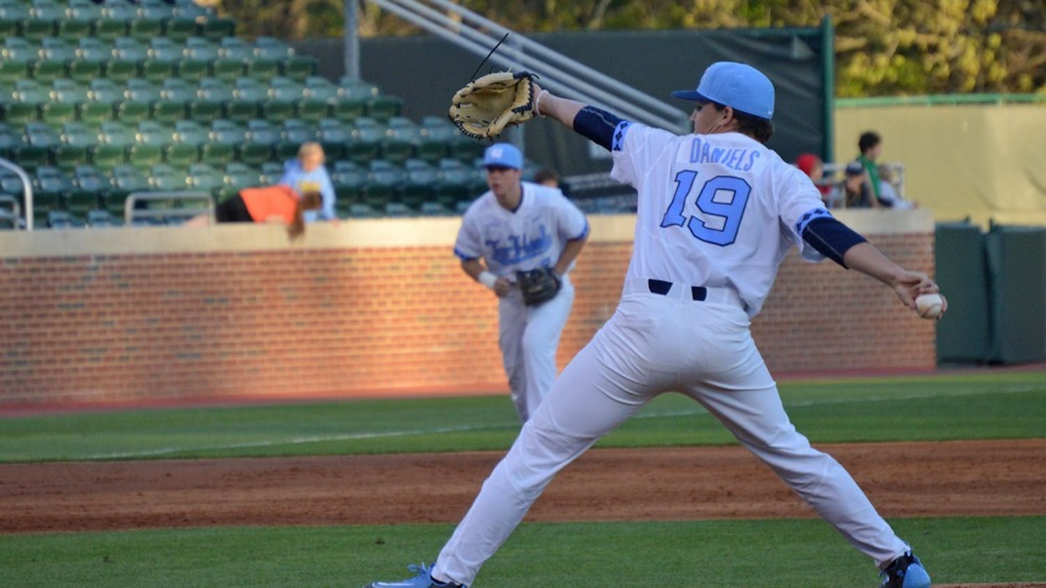 Sophomore Brett Daniels (19) pitches the ball during the game against Davidson College on Tuesday. The Tar Heels won 10-2.