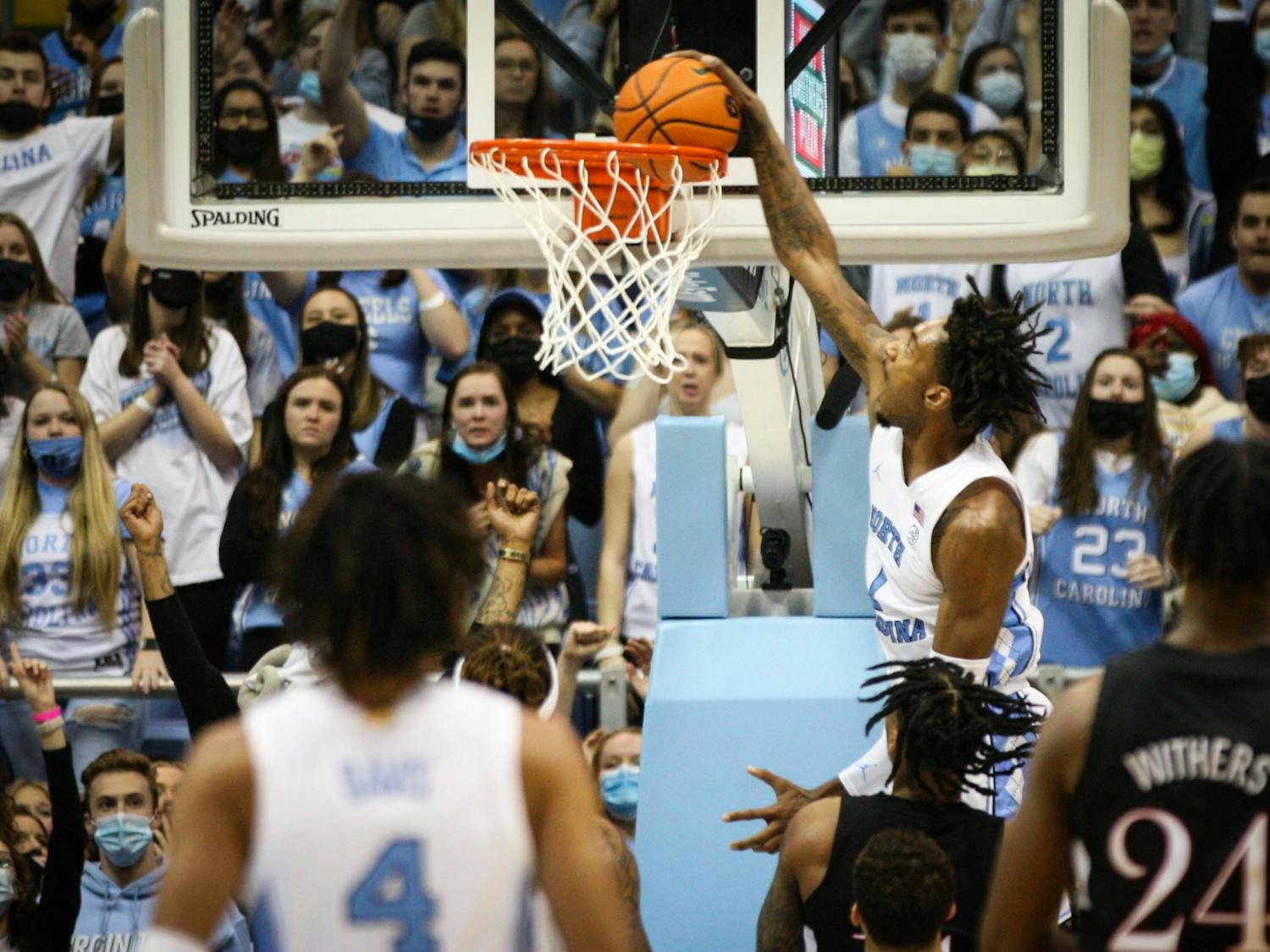 UNC senior forward Leaky Black (1) dunks the ball during a home men's basketball game against Louisville on Monday, Feb. 21, 2022. UNC won 70-63.
