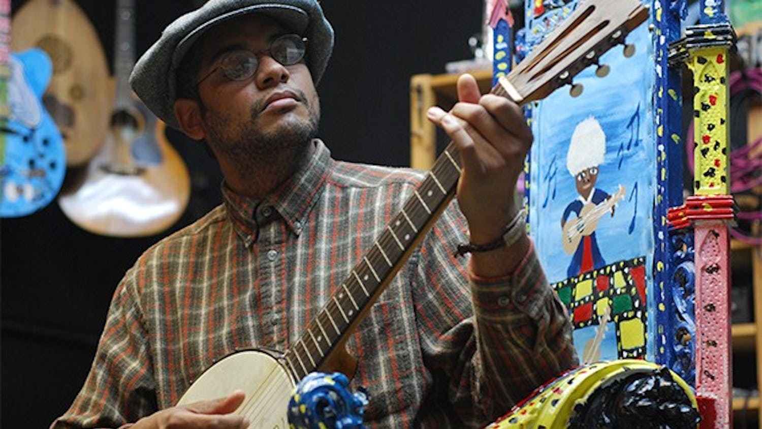Profile are of Dom Flemons of the Carolina Chocolate Drops in his studio Music Maker Relief Foundation in Hillsborough. 