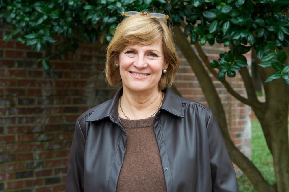 Mimi Chapman, the current chair of the faculty, poses for a portrait outside the UNC School of Social Work on Jan. 9. Chapman states her goal for the new semester is "to improve communication between the various (leadership) groups."