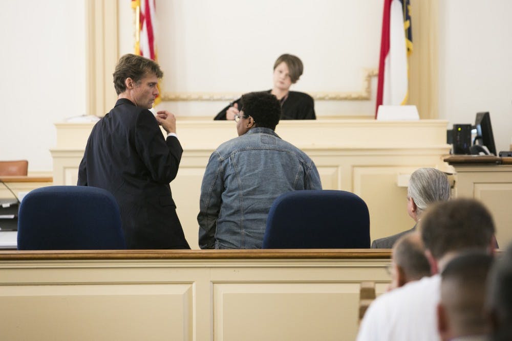 <p>Maya Little and her lawyer converse at the start of her hearing on Monday, Oct. 15, 2018, in Hillsboro N.C.</p>