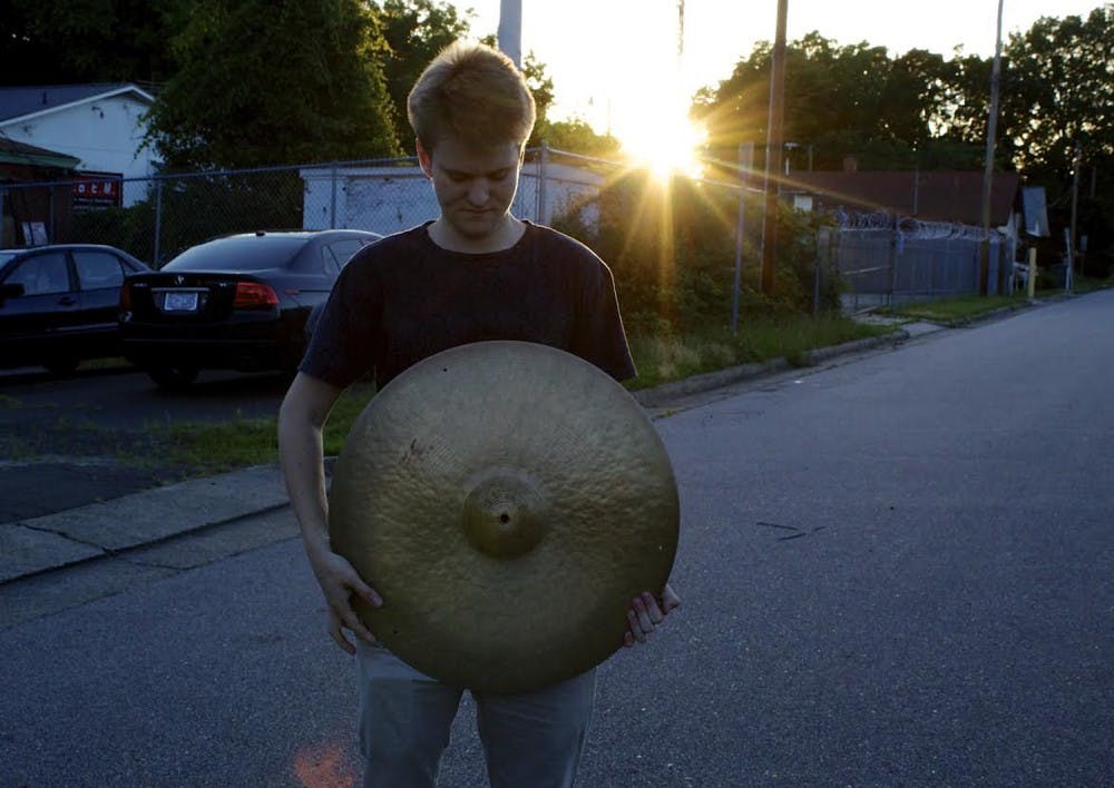 Atticus Reynolds is a UNC senior who composes the music and plays the drums on the EMIT EP. Photo Courtesy of Atticus Reynolds.