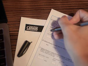 DTH Photo Illustration. A student fills out the United States Census. The 2020 Census is a critical way for students to stay civically engaged and for their voices to be counted for.
