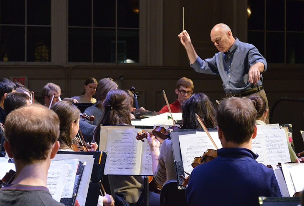 Professor Tonu Kallan directs the UNC Symphony Orchestra at their rehearsal on Monday, February 17, 2014.  The orchestra is rehearsing for their concert featuring two student soloists and Vincent Pouazsay, an undergraduate guest conductor.  The concert will be held on Tuesday, February 18. 
