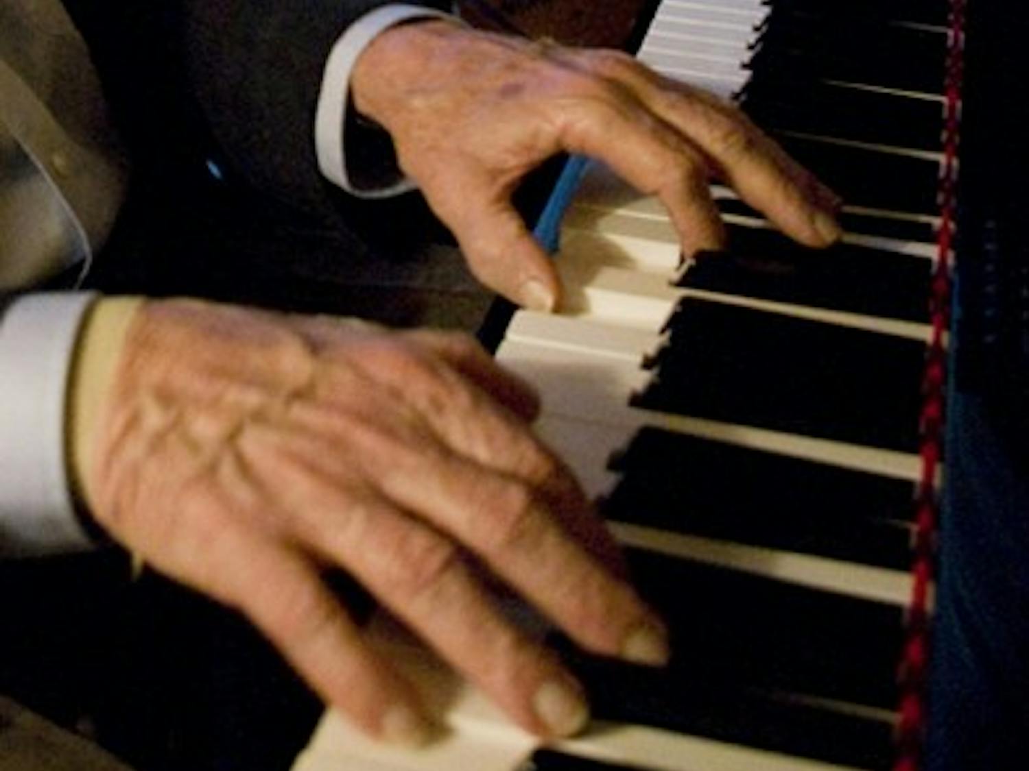 Pianist Jim Crisp plays with bassist Rick Keena and drummer Bubba Norwood at the Franklin Hotel. A resident of Chapel Hill since the 1960s, Crisp and his trio have been holding sway Wednesday at the Franklin for the past four years.