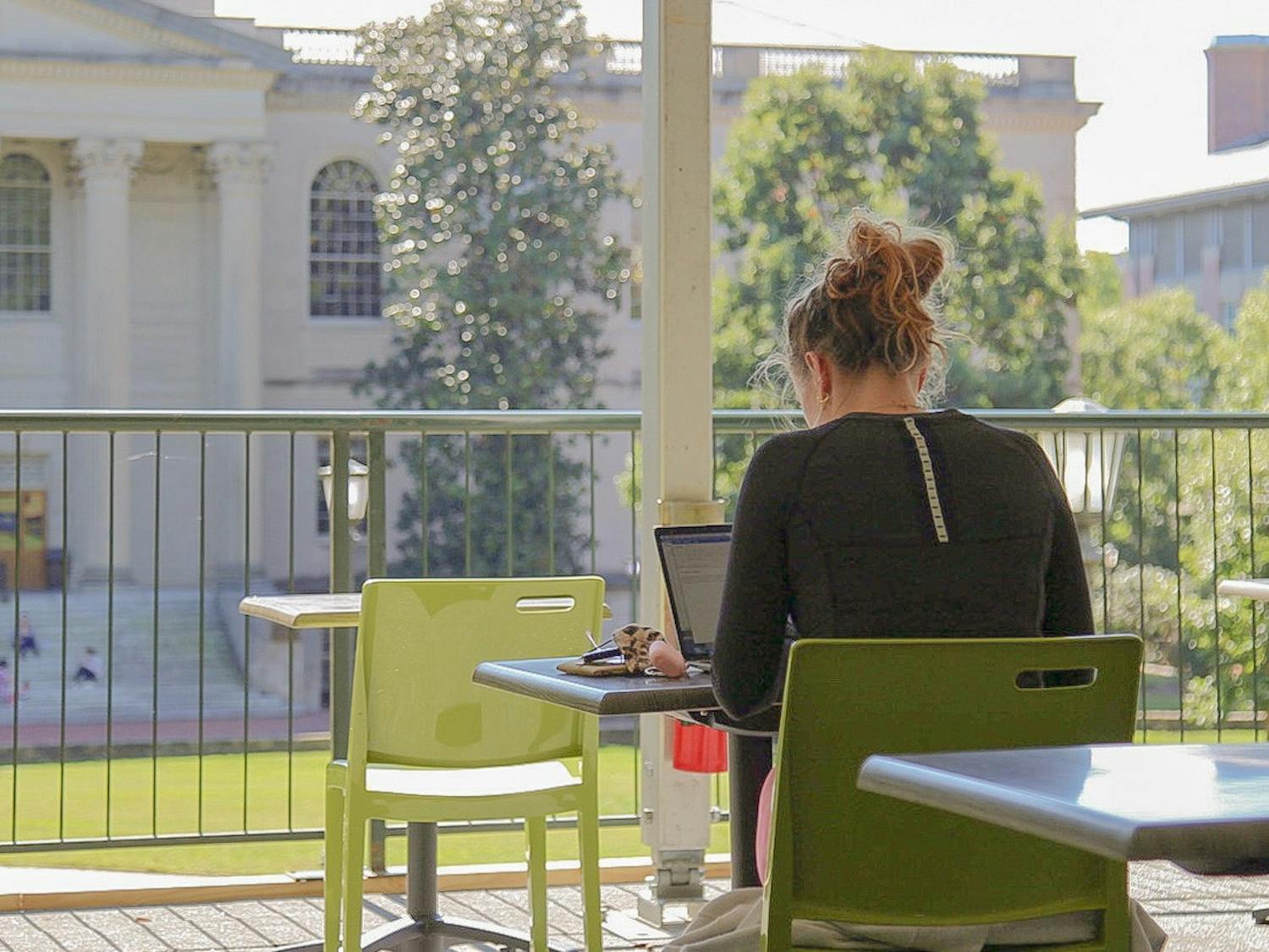 A student studies at the outdoor study space on the quad on Monday, Oct. 5, 2020.