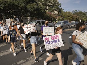 University of Texas students march from the UT campus to the state Capitol on Sept. 7, to protest the state law banning abortions after six weeks. Photo courtesy of Jay Janner/Austin American-Statesman/TNS.