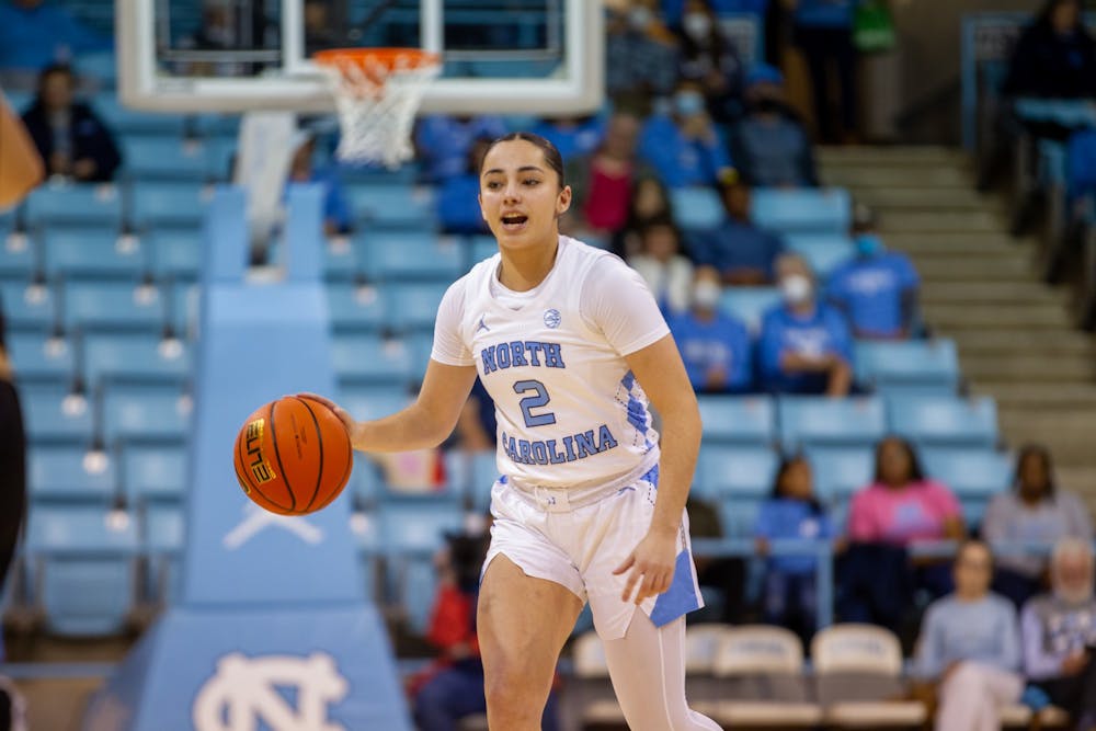 UNC first-year guard Paulina Paris (2) dribbles the ball during the women's basketball game against the Wofford Terriers in Carmichael Arena on Sunday, Dec. 11, 2022.