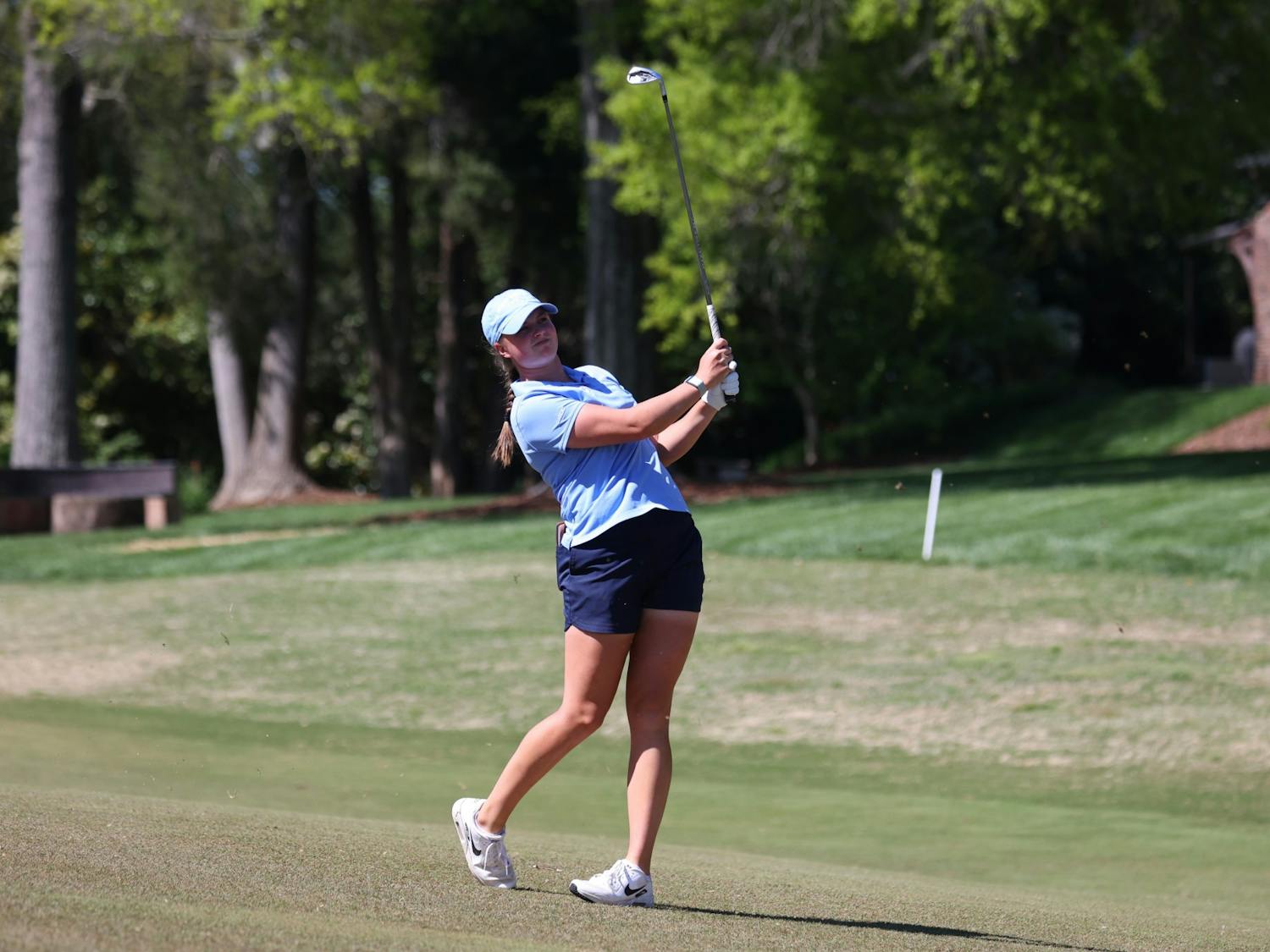UNC first-year Megan Streicher swings her golf club during the 2023 ACC Women's Golf Championship at Sedgefield Country Club in Greensboro, North Carolina, on April 13, 2023. 
Photo Courtesy of Andy Mead/YCJ.