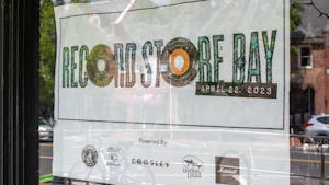 A flyer for “Record Store Day” hangs outside of Schoolkids Records in Chapel Hill on Tuesday, April 25, 2023.