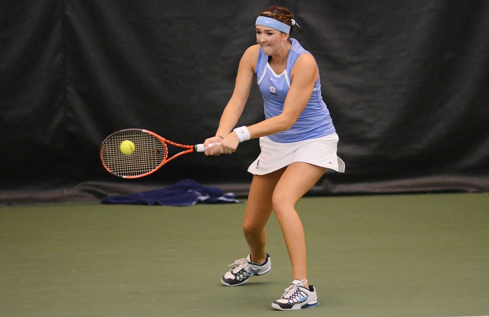 UNC Sophomore Caroline Price returns the ball in her singles match against Danielle Collins. 