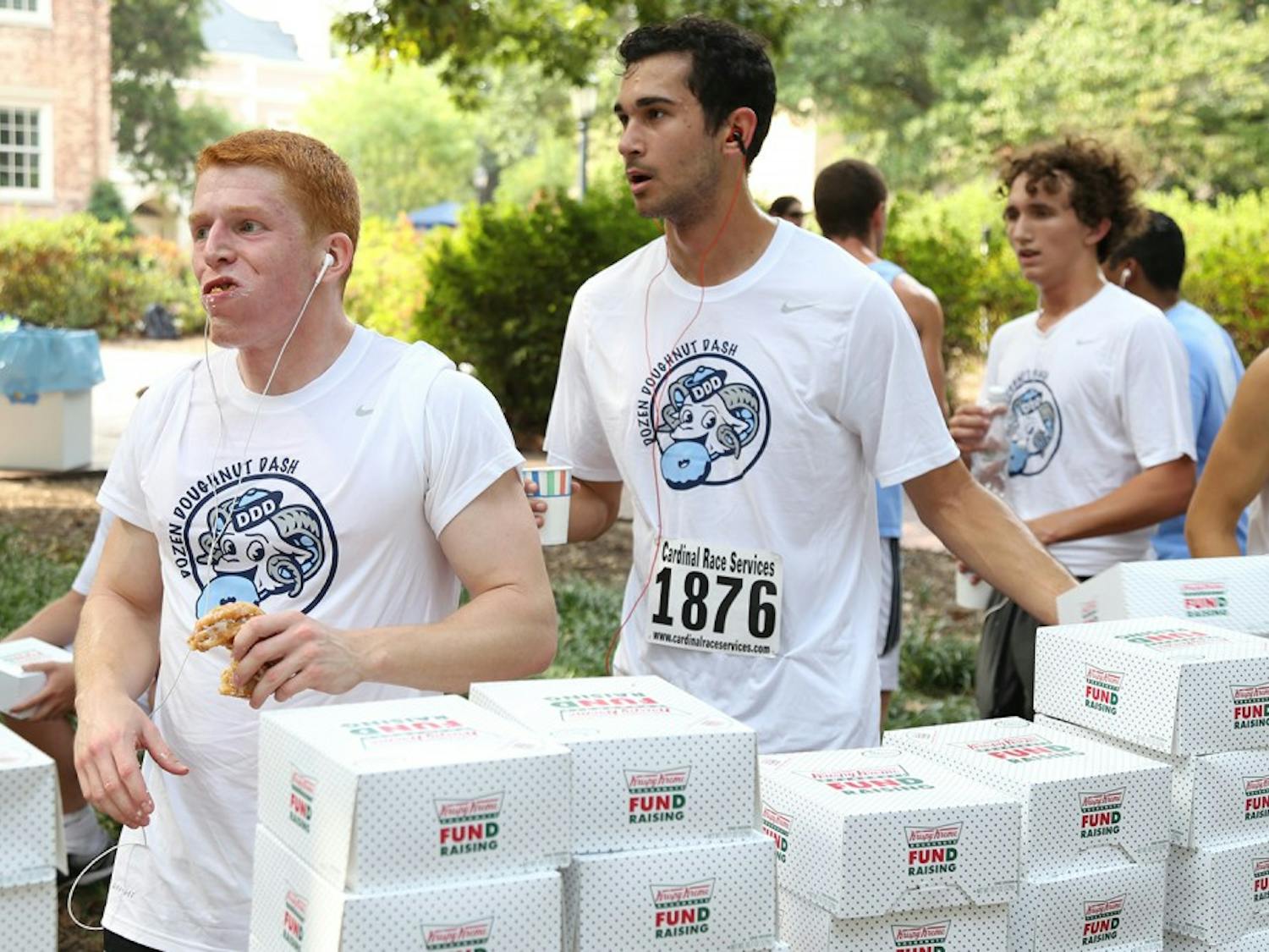 The Dozen Donut Dash began at the Old Well on Friday morning in September 2015. Participants had to run 2.5 miles before eating a dozen Krispy Kreme donuts and running another 1.5 miles. The race raises awareness and support for cancer patients.&nbsp;