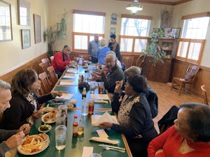 Some of the Black Pioneers and their spouses meet for lunch at Mama Dip’s in early 2020. Photo courtesy of Walter A. Jackson. 