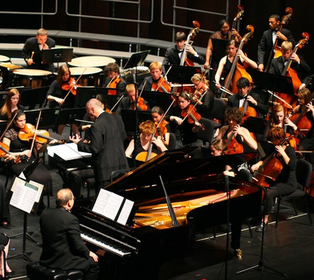 UNC music professor Stephen Anderson (on the piano) premiered his original composition, “Dysfunctional.”  DTH/Daixi Xu