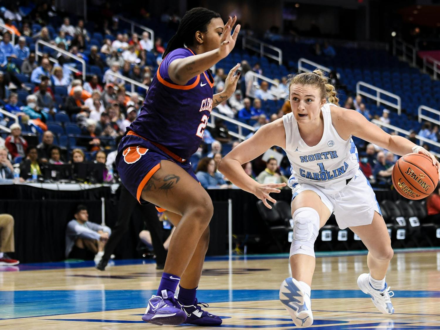Junior guard and forward Alyssa Utsby (1) drives the ball to the basket in the game against Clemson University in the second round of ACC Championship in Greensboro, N.C. UNC won 68-58.