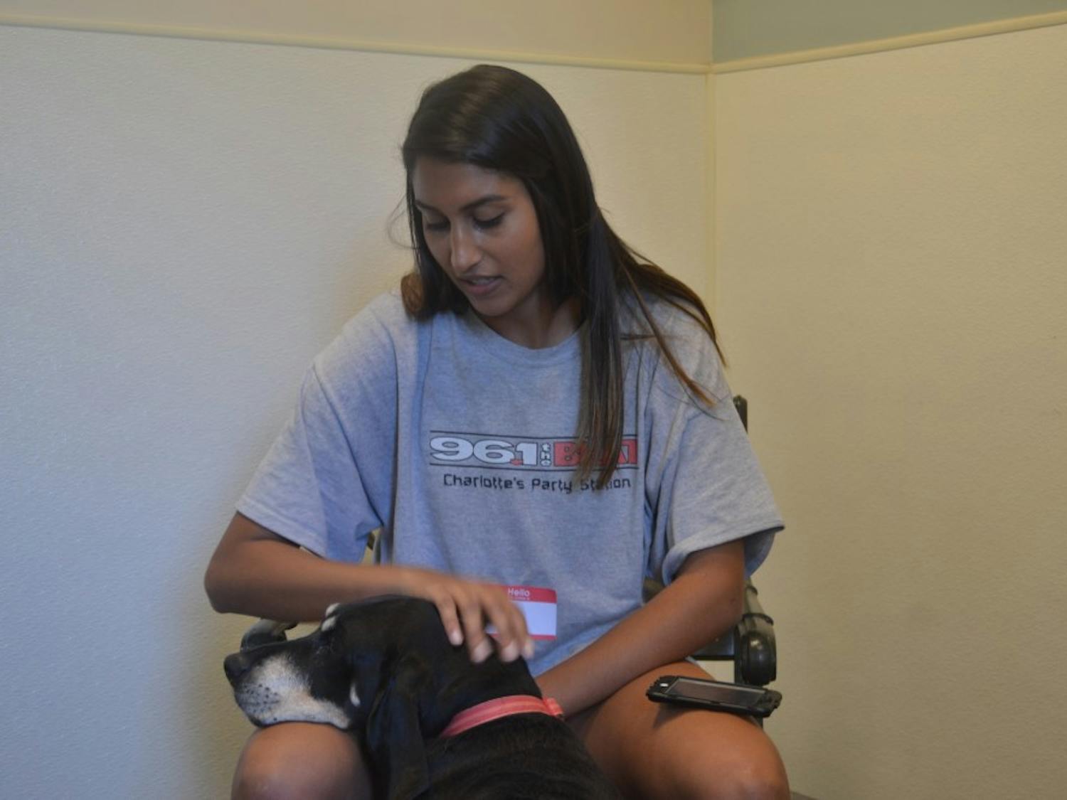 Juhi Patel, a senior computer science major at UNC, volunteers twice a week at the Orange County Animal Services in Chapel Hill.&nbsp;