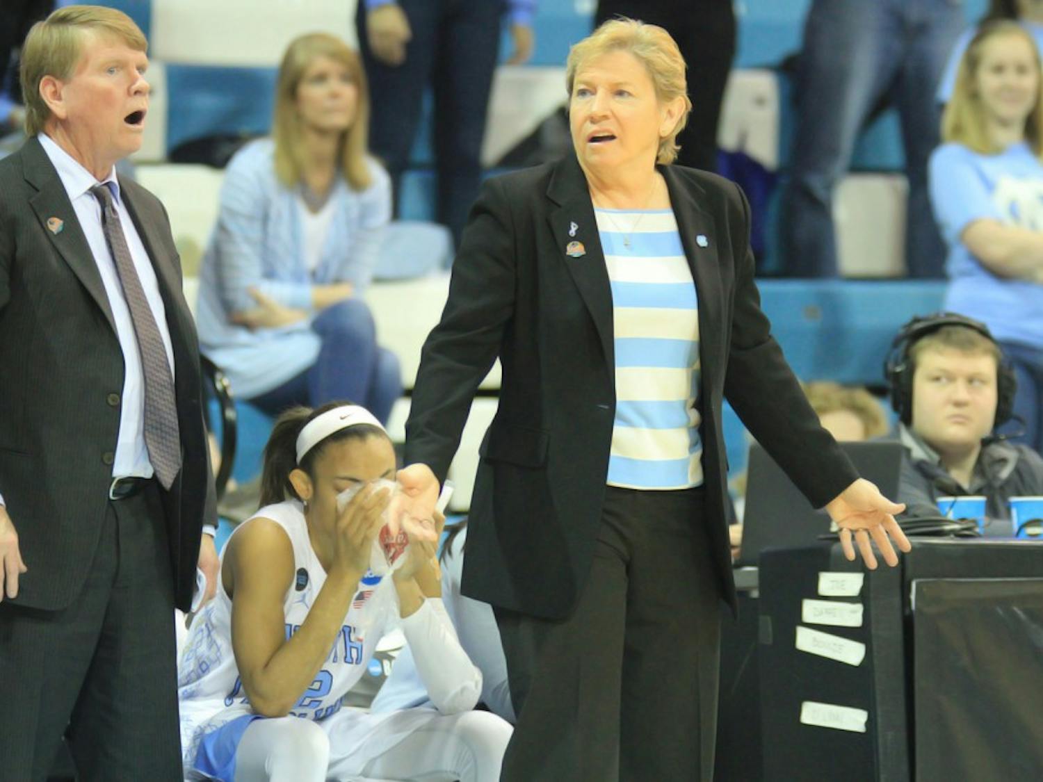 North Carolina coaches Andrew Calder (left) and Sylvia Hatchell react to a call during Saturday afternoon's game against Liberty. The Tar Heel won 71-65.